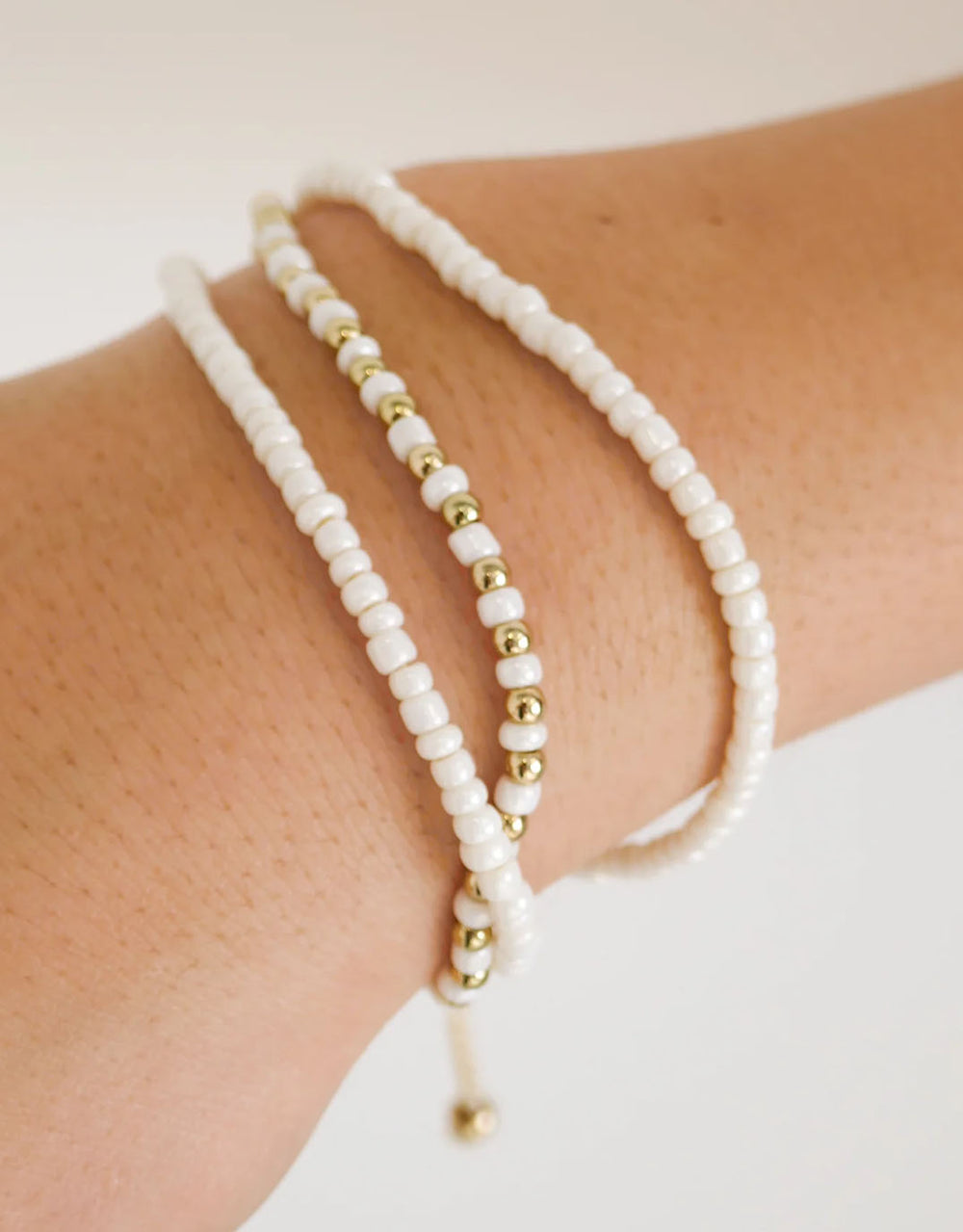 humble-heart-triple-bead-gold-white-gold-bracelet